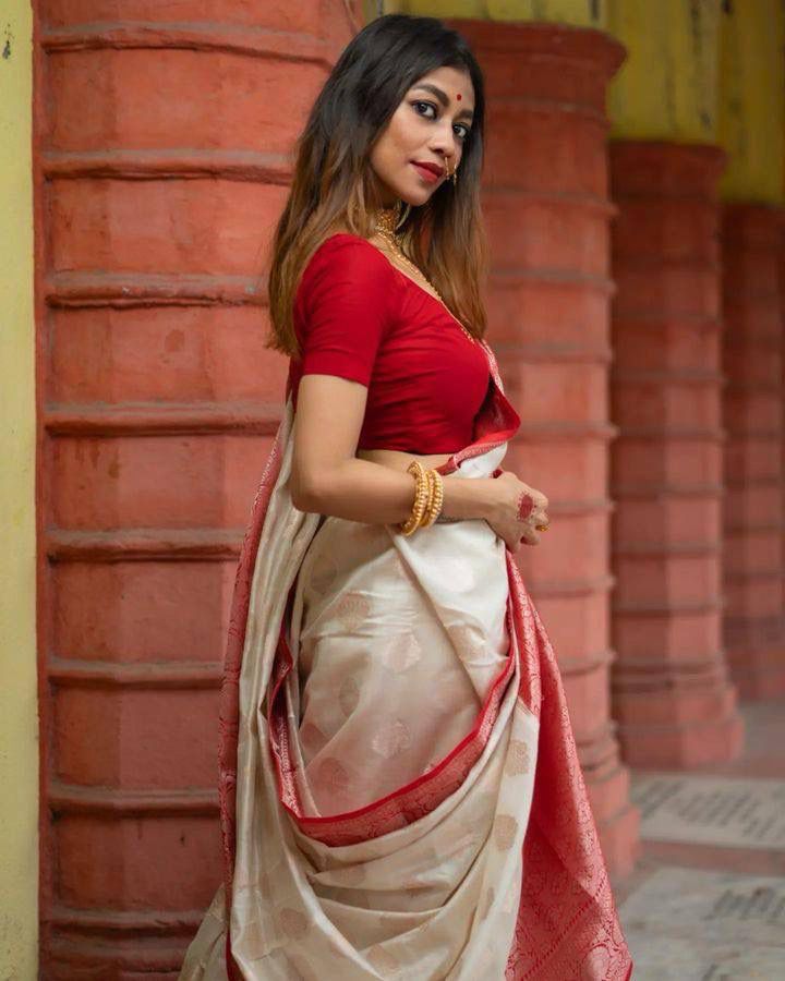 THE BEAUTIFUL LUSTER ON THE SAREE MAKES IT EXTREMELY STUNNING. THE SAREE WILL GIVE YOU AN ELEGANT LOOK AS IT IS MADE FROM BEAUTIFUL SILK FABRIC. THIS SAREE WOULD LOOK GREAT WITH GOLDEN JEWELRY.