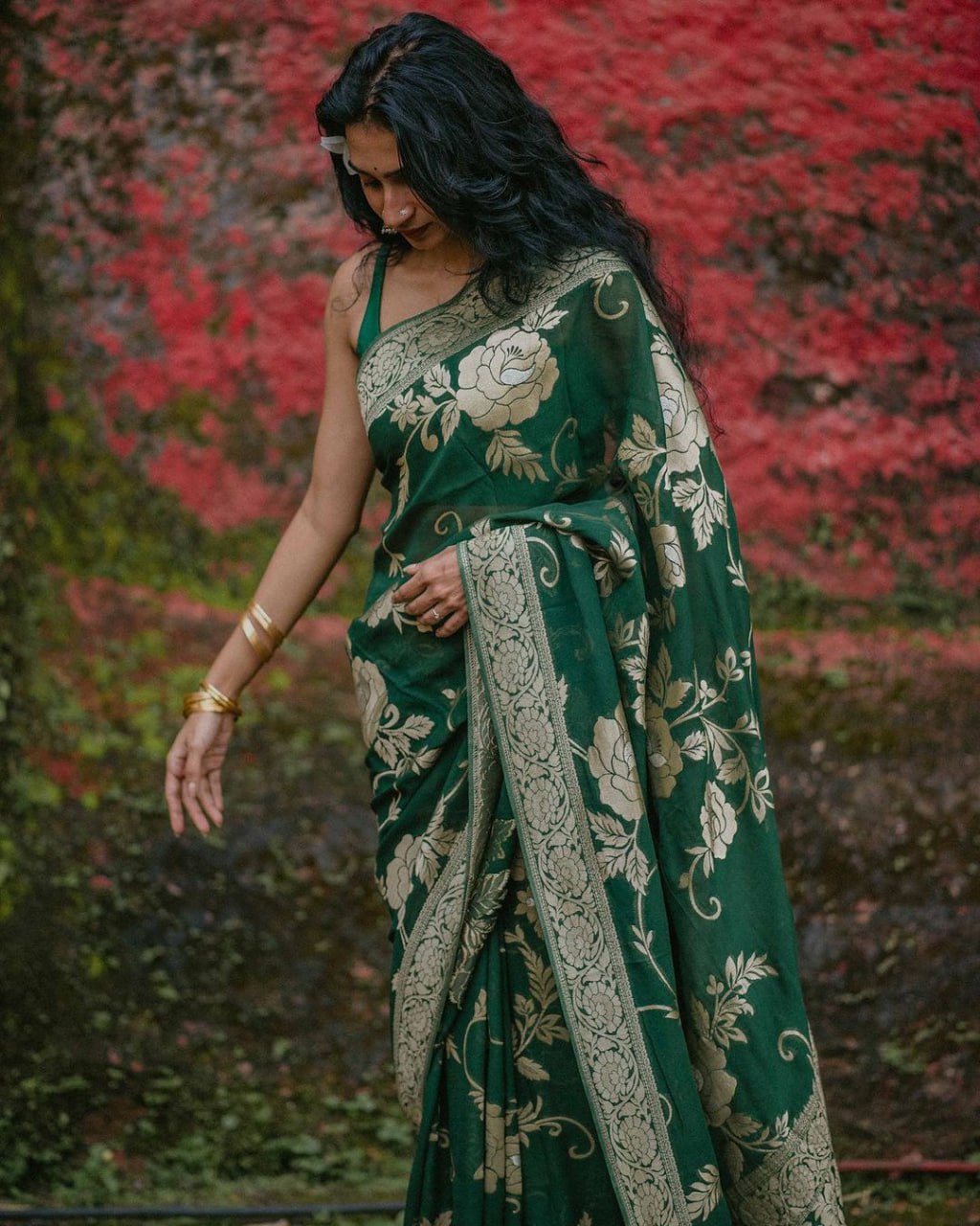 SILK THREADS WOVEN USING INTRICATE TECHNIQUES. SAREES WITH HEAVY BROCADE WORK AND GOLD  ZARI WORK ARE ITS MOST STRIKING FEATURES