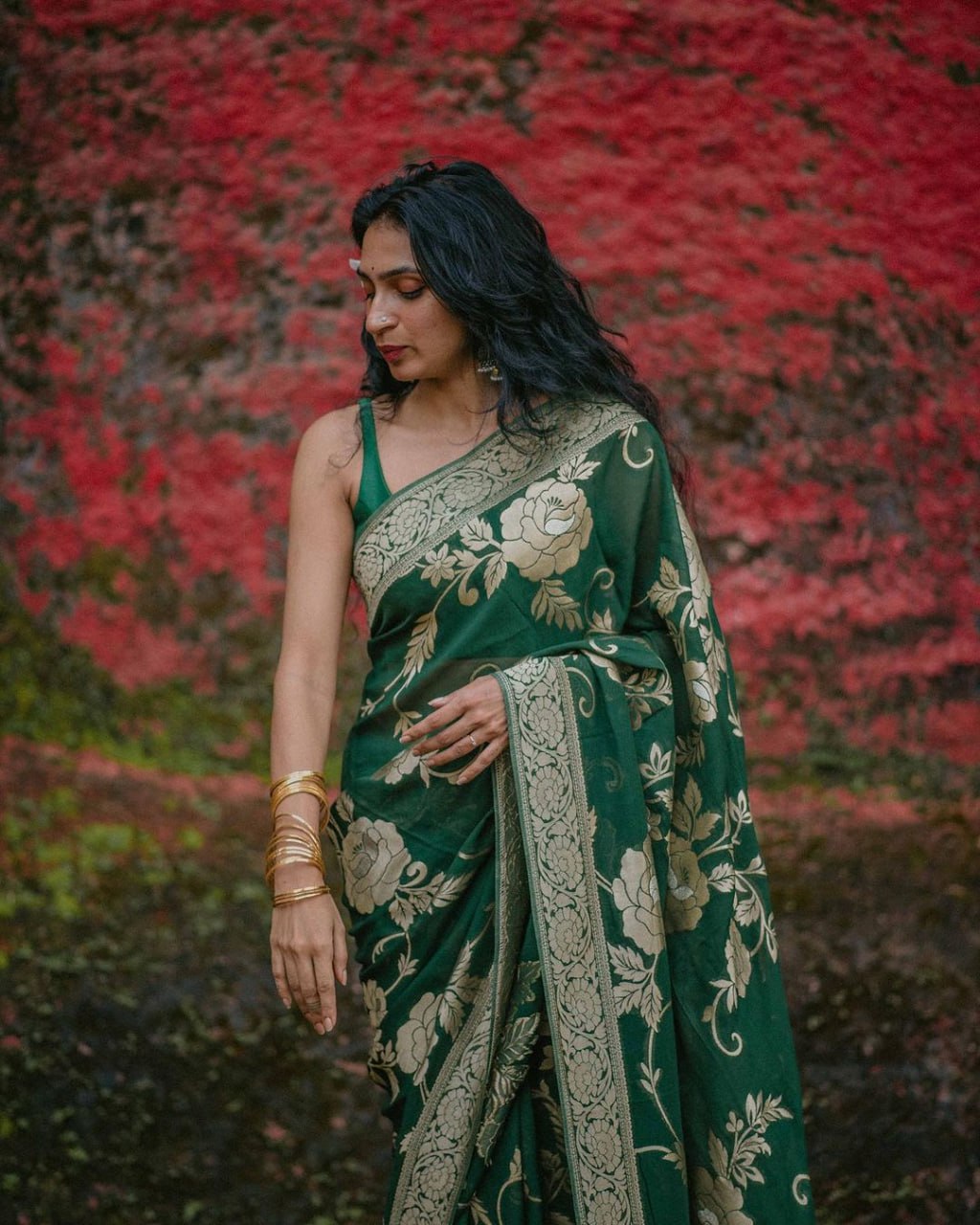 SILK THREADS WOVEN USING INTRICATE TECHNIQUES. SAREES WITH HEAVY BROCADE WORK AND GOLD  ZARI WORK ARE ITS MOST STRIKING FEATURES