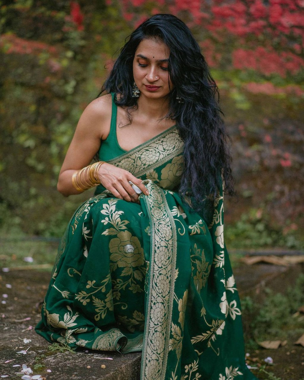 SILK THREADS WOVEN USING INTRICATE TECHNIQUES. SAREES WITH HEAVY BROCADE WORK AND GOLD  ZARI WORK ARE ITS MOST STRIKING FEATURES