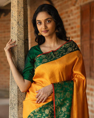 SILK THREADS WOVEN USING INTRICATE TECHNIQUES. SAREES WITH HEAVY BROCADE WORK AND GOLD  ZARI WORK ARE ITS MOST STRIKING FEATURES