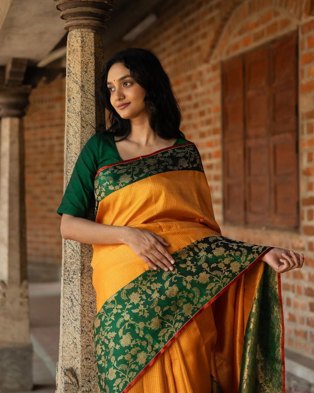 SILK THREADS WOVEN USING INTRICATE TECHNIQUES. SAREES WITH HEAVY BROCADE WORK AND GOLD  ZARI WORK ARE ITS MOST STRIKING FEATURES