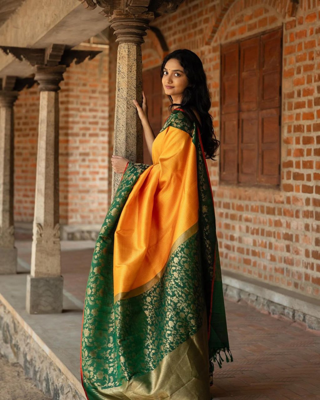 SILK THREADS WOVEN USING INTRICATE TECHNIQUES. SAREES WITH HEAVY BROCADE WORK AND GOLD  ZARI WORK ARE ITS MOST STRIKING FEATURES