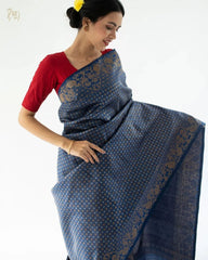 SILK THREADS WOVEN USING INTRICATE TECHNIQUES. SAREES WITH HEAVY BROCADE WORK AND GOLD  ZARI WORK ARE ITS MOST STRIKING FEATURES